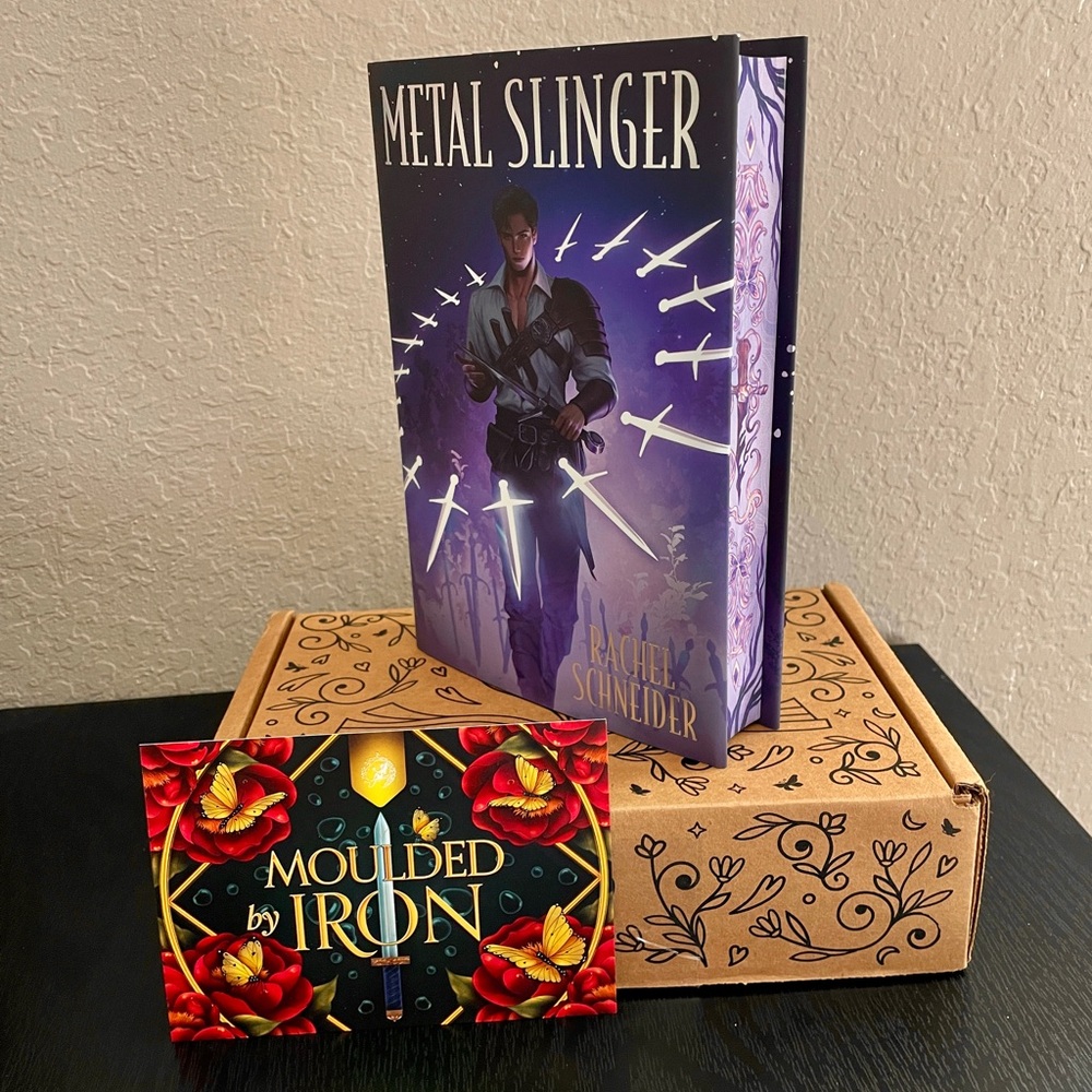 FairyLoot Romantasy Box September 2025
Metal Slinger by Rachel Schneider